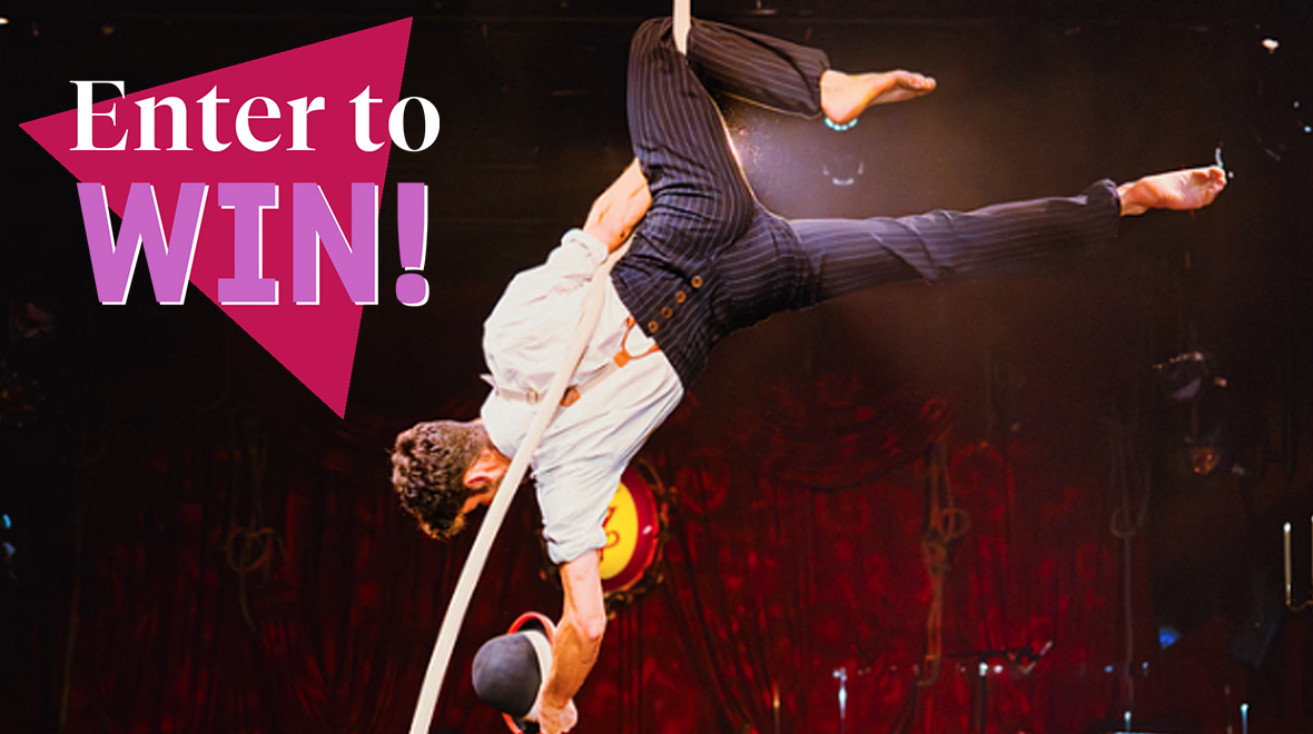 "Enter to Win!" text over circus performer