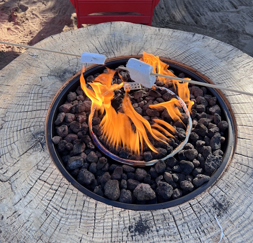 Roasting marshmallows over a fire at Brasada Ranch