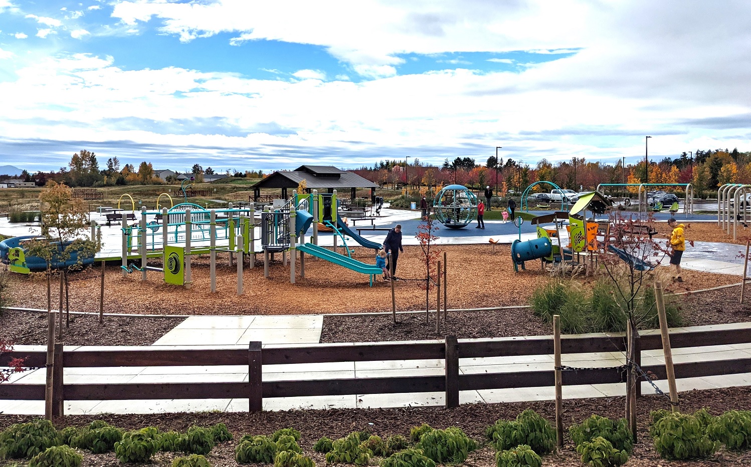 Wide view of the playground at newer Cordata Park on the north side of Bellingham, a smaller city and great getaway destination for Seattle-area families