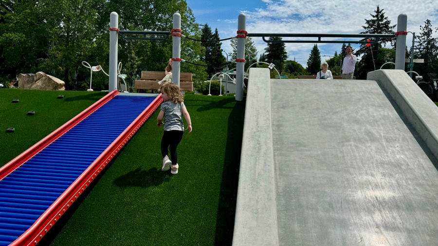 Seattle’s newest playground Pathways Park has turf for accessibility and wide slides