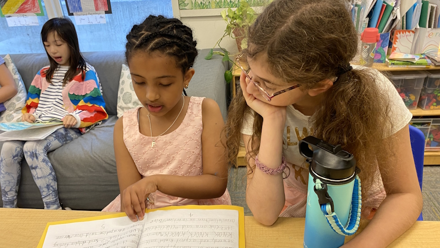 Two girls who are students at the Little School