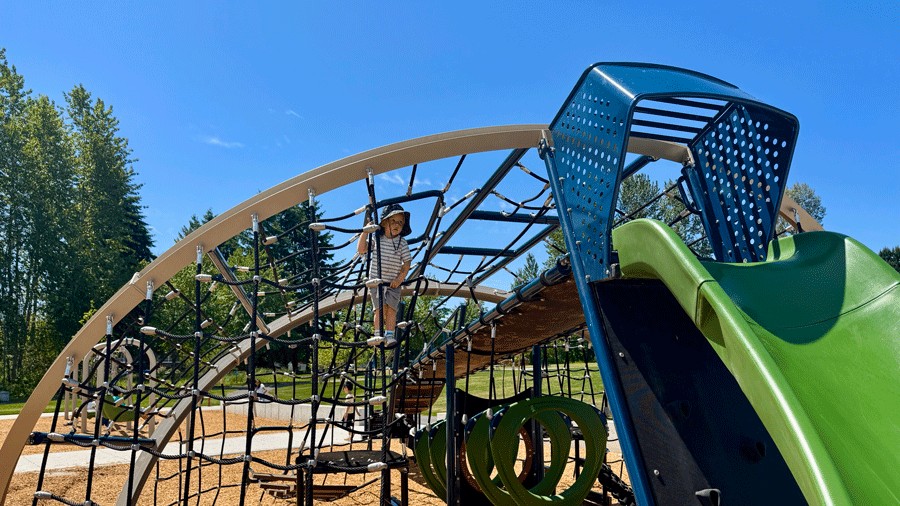 young child climbing at Springwood Park in Kent