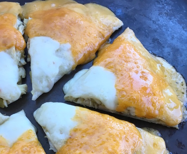 Three-cheese candy corn quesadillas