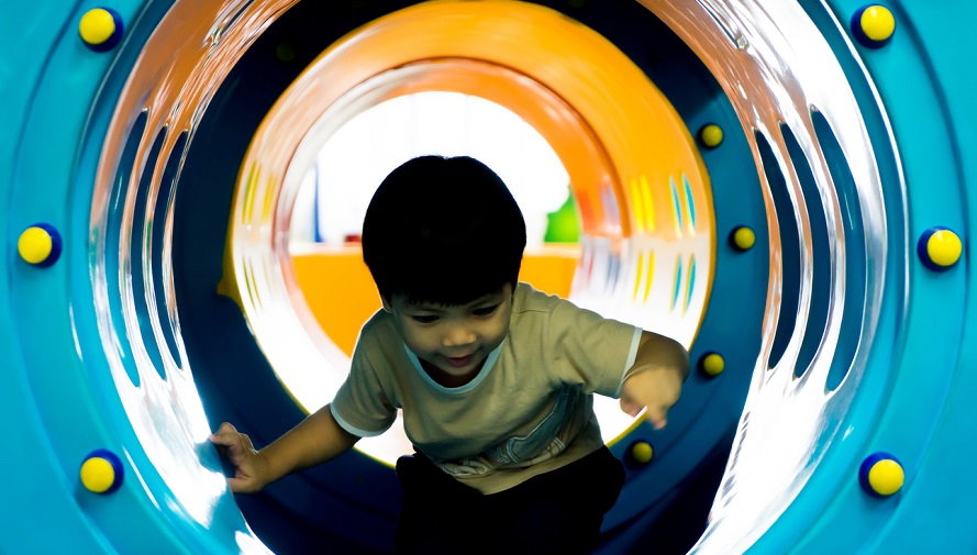 Child playing at an indoor playground