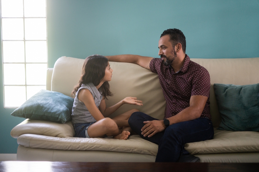 dad talking with daughter