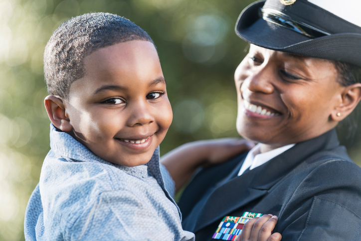 Kid with mom in Navy uniform
