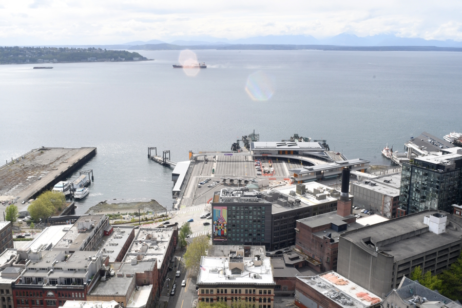 View of Elliott Bay from the Smith Tower Observatory, including the new Habitat Beach next to the ferry terminal pioneer square family activities
