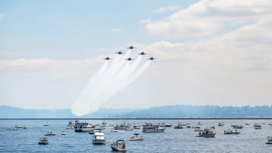 Blue Angels flying over the water in Seattle for Seafair