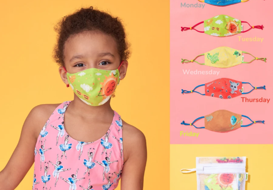 girl wearing a crayola mask