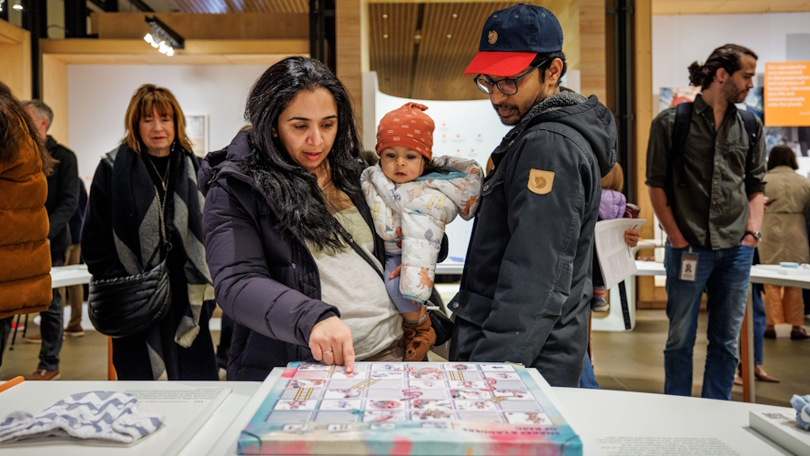 Visitors at the Designing Motherhood exhibit