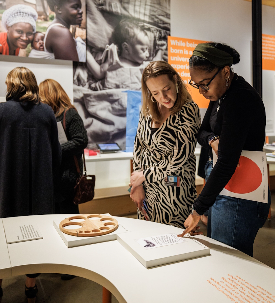 Visitors to the Designing Motherhood exhibit