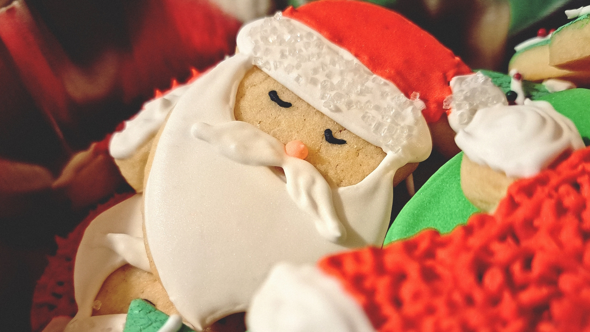 Christmas cookie decorated like Santa holiday treat