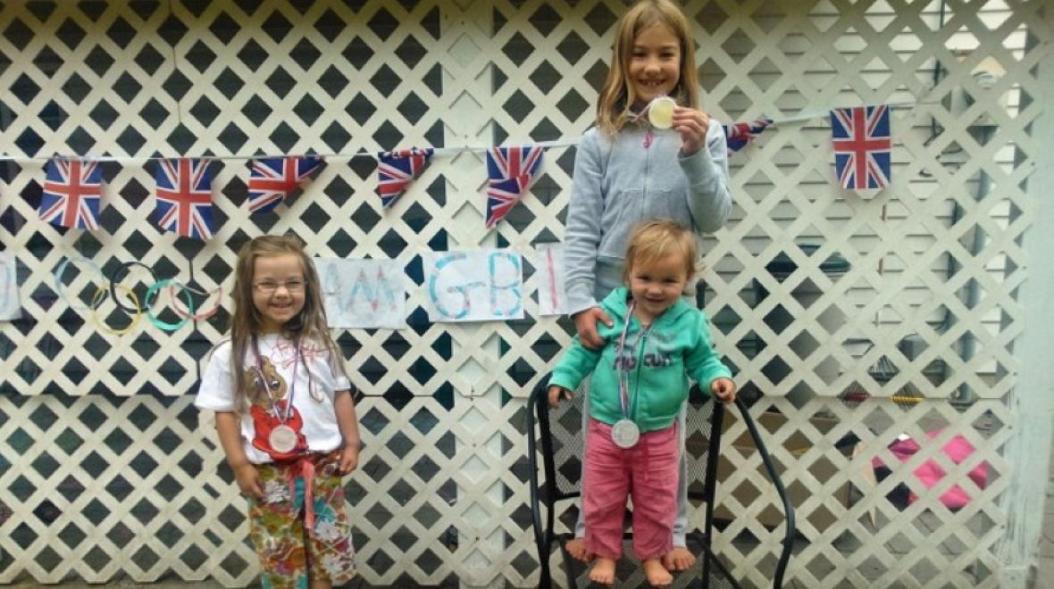 Kids playing Olympic-style games at home