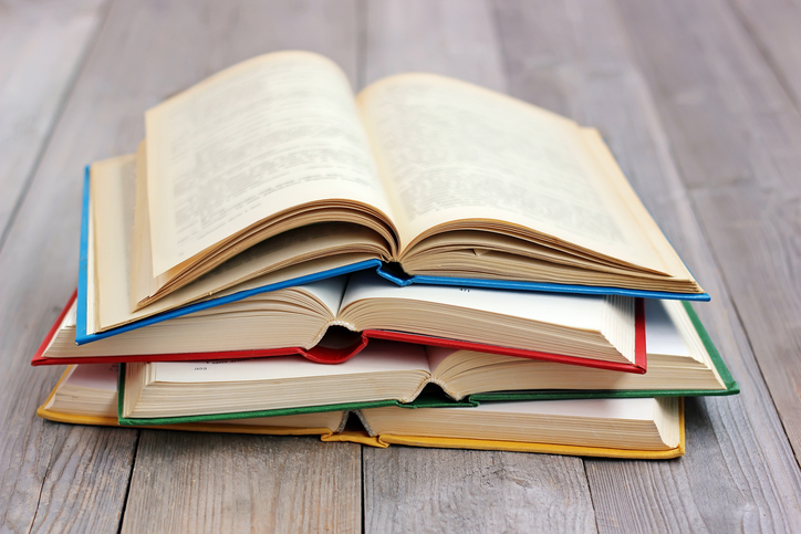 Stack of open books