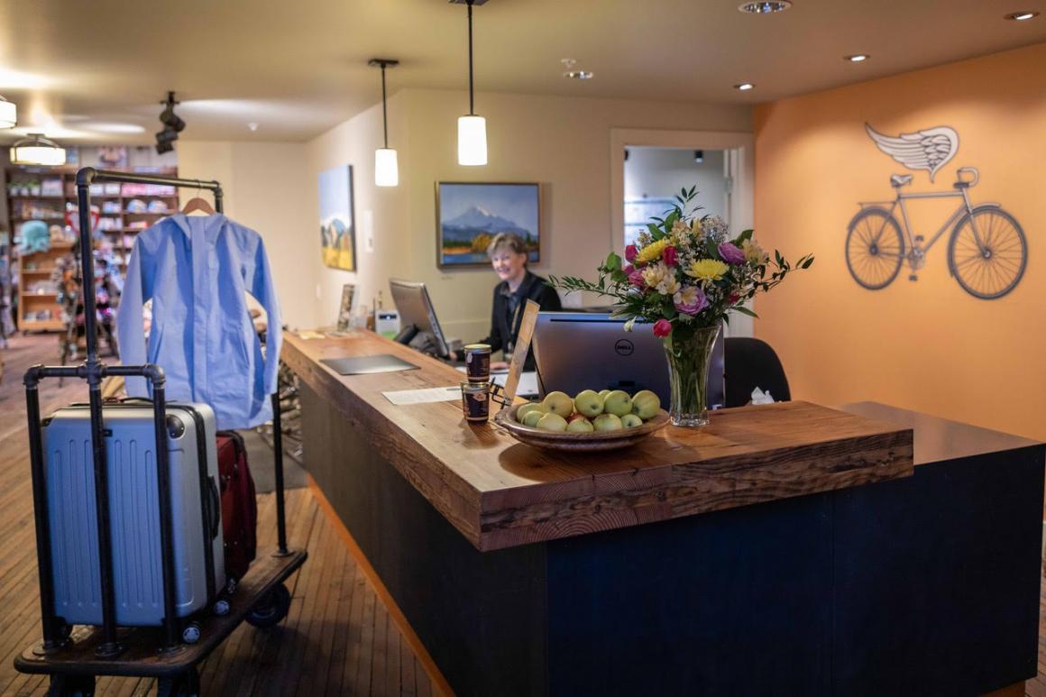 Inn at Lynden General Manager Teri Treat at the hotel check-in desk