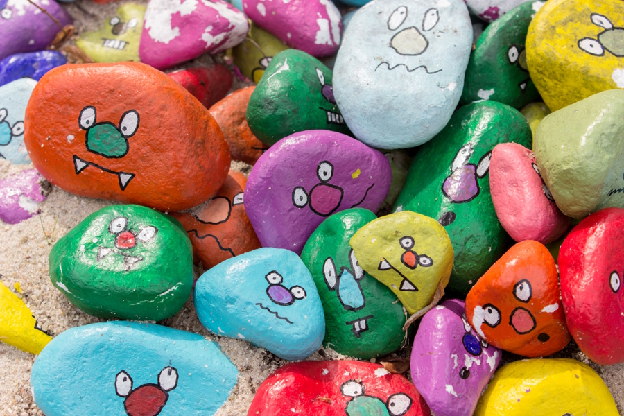 Rocks painted like monsters is a fun Halloween craft activity