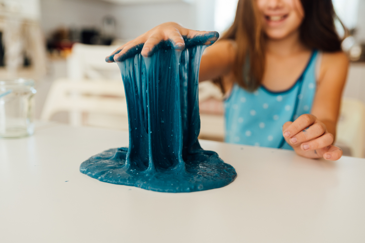 child playing with DIY slime