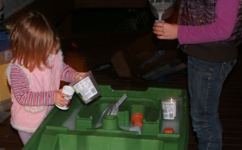 Playing with water after dark glow in the dark water play
