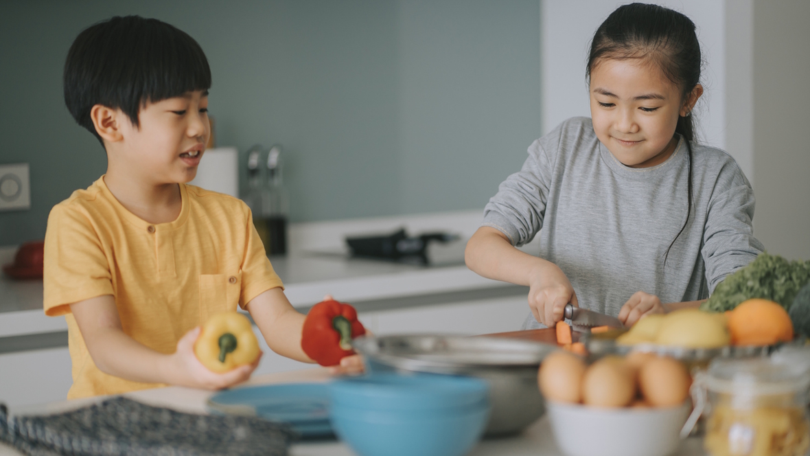 Kids cooking at home during summer vacation
