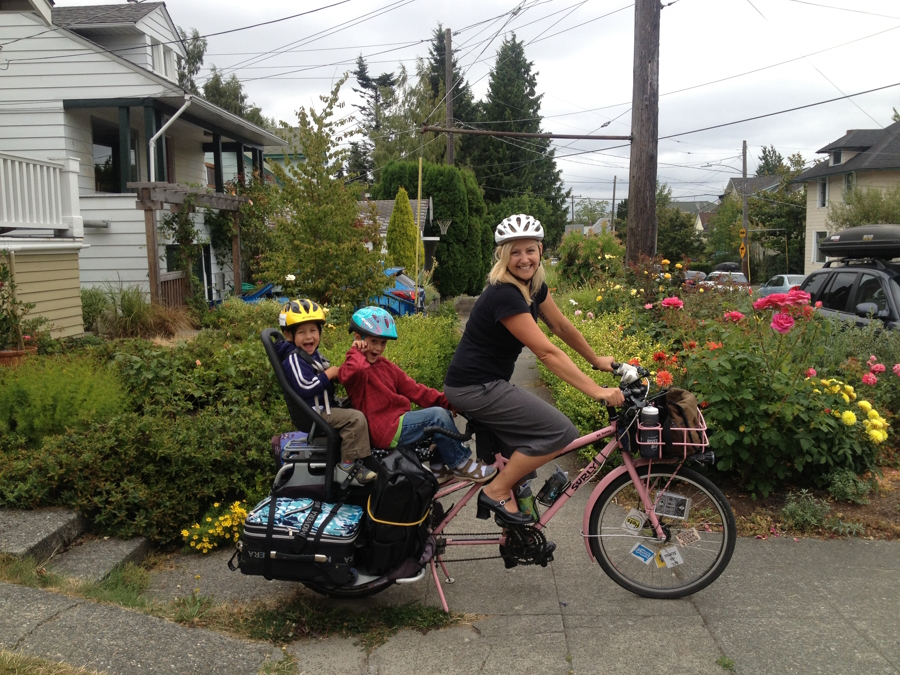 Madi Carlson with kids in tow demonstrating sustainability