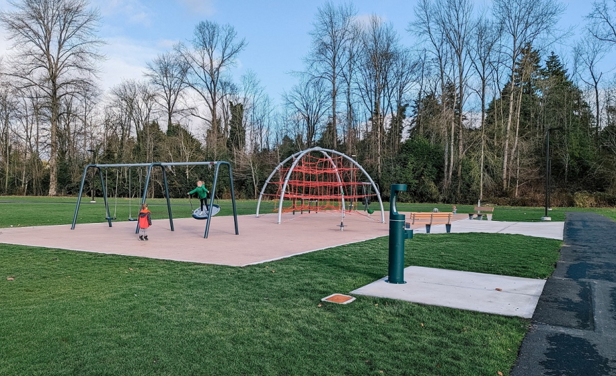 Kids play on the new playground at Seattle's Skyway Park