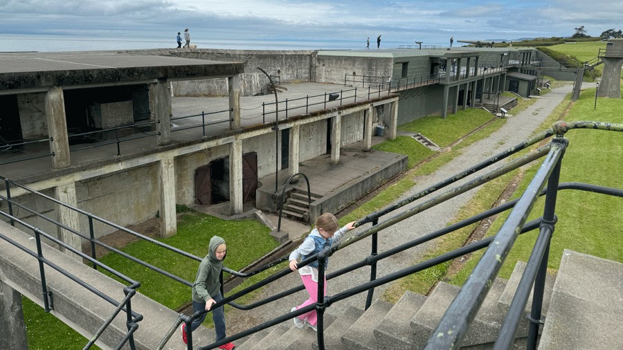 Young kids climb the stares at Fort Casey Historical State Park