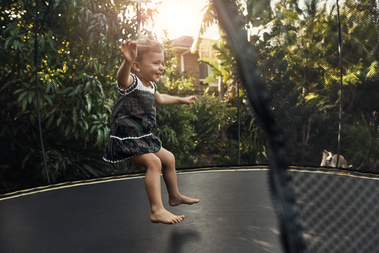 little girl on a trampoline