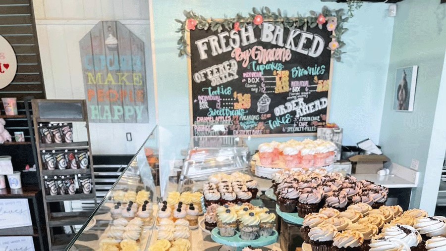 cupcake display and sweet treats at Gracene's Cupcake Boutique in Black Diamond
