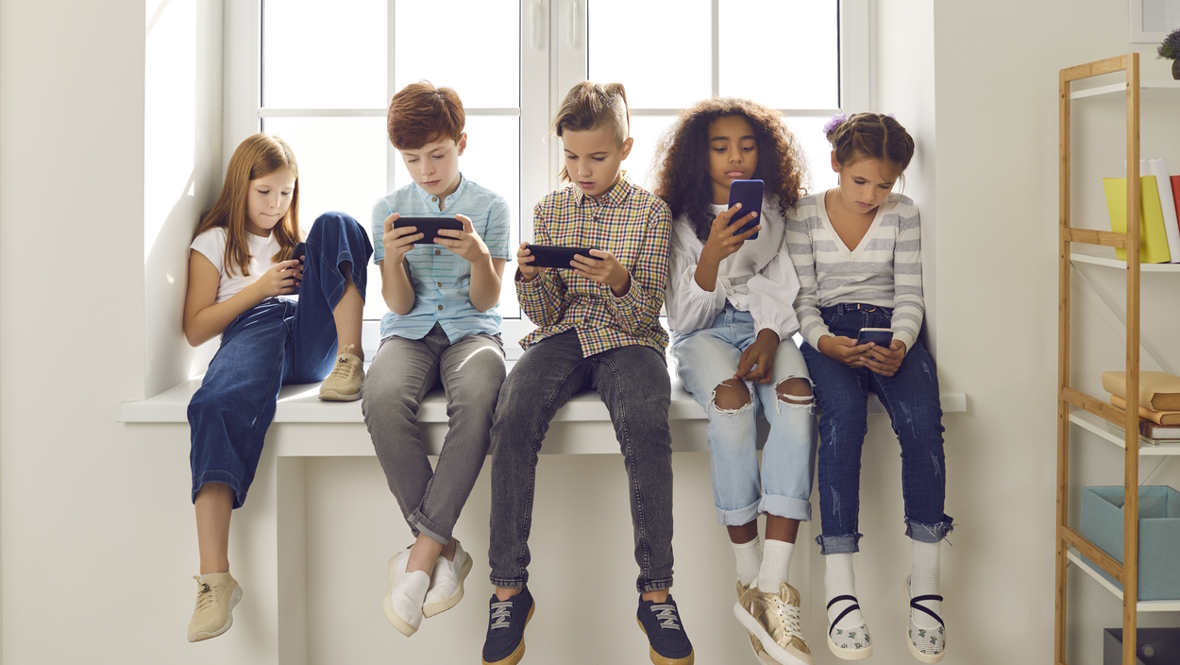 Group of kids using social media