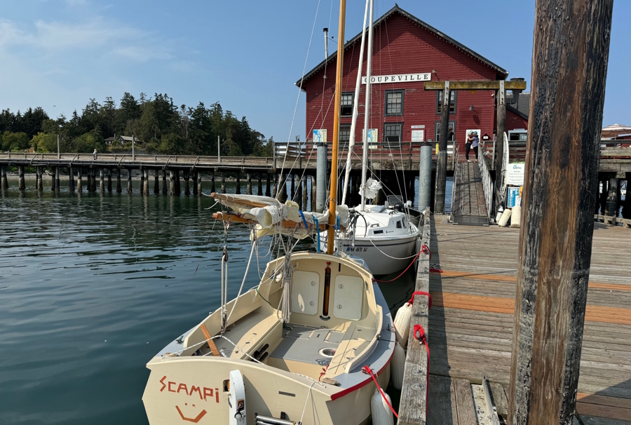 Kids walking along the dock in Coupeville on Whidbey Island