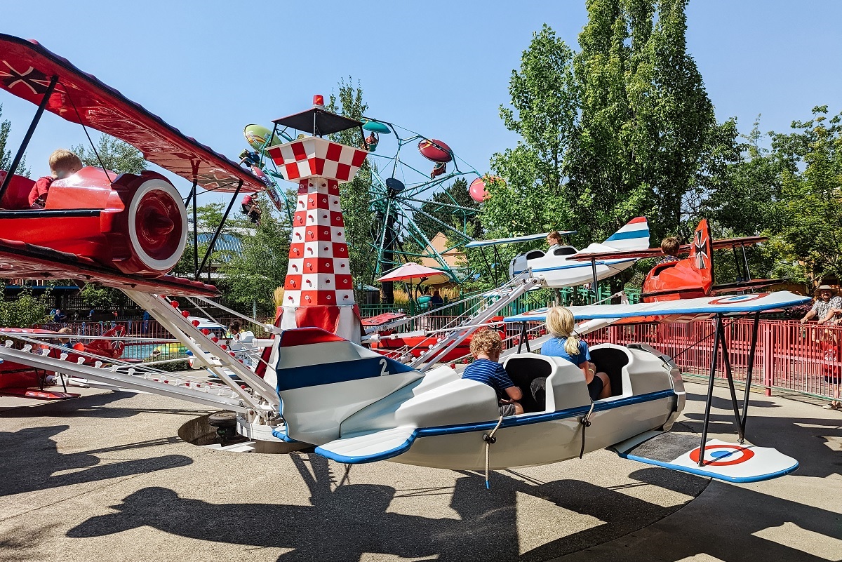 Kids ride an airplane ride at Silverwood Theme Park in Idaho near Spokane, Wash.