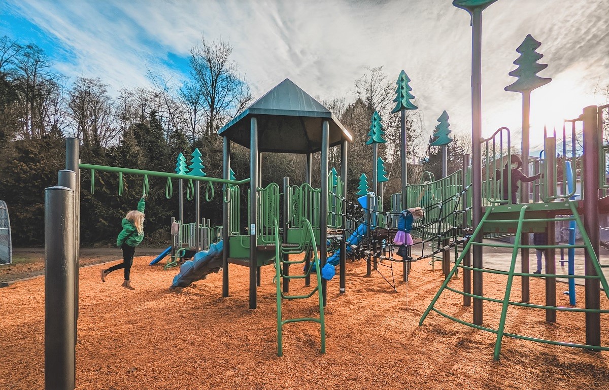 Kids play on the new play structure at Seattle's Fairmount Playground South Seattle kids families