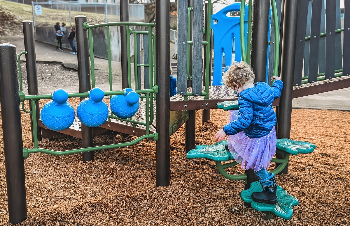 Testing out the leaf steps at the new play structure at Fairmount Playground in West Seattle 