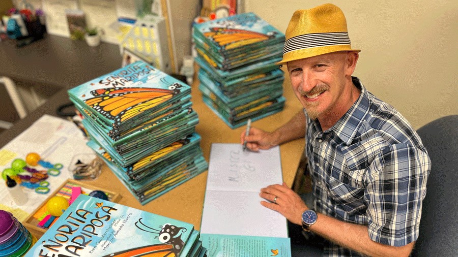 MISTER G signing copies of his book Senorita Mariposa