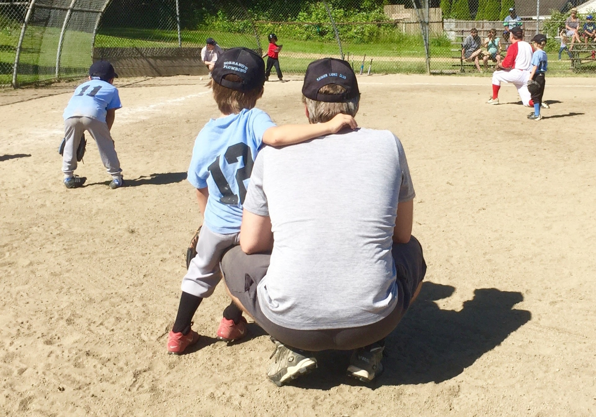 Youth sports baseball dad and son