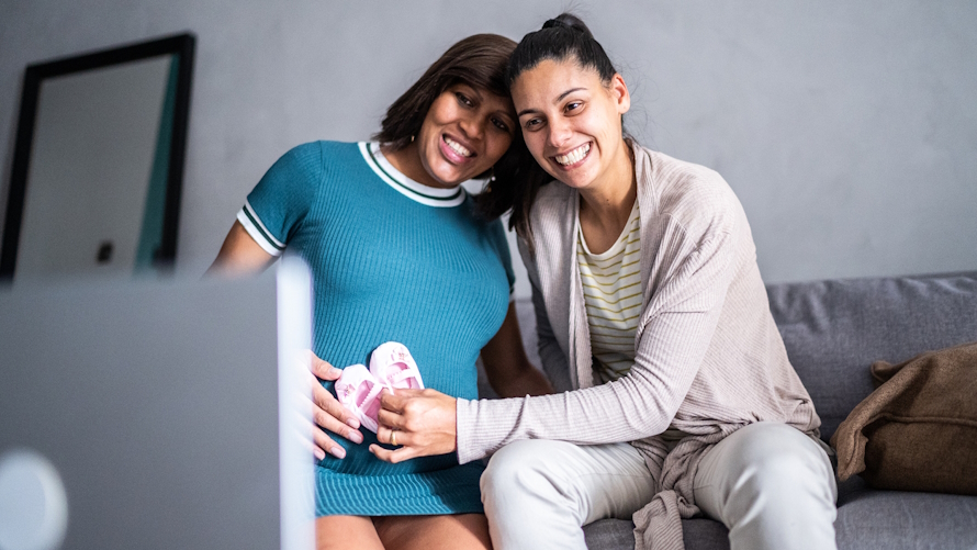 LGBTQ couple expecting a baby on a Zoom call