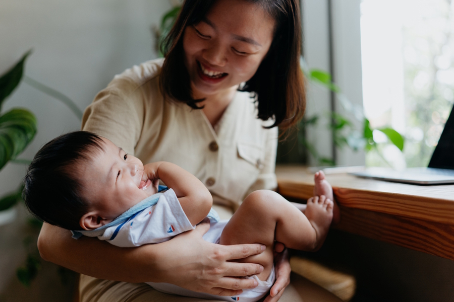 happy mom with baby