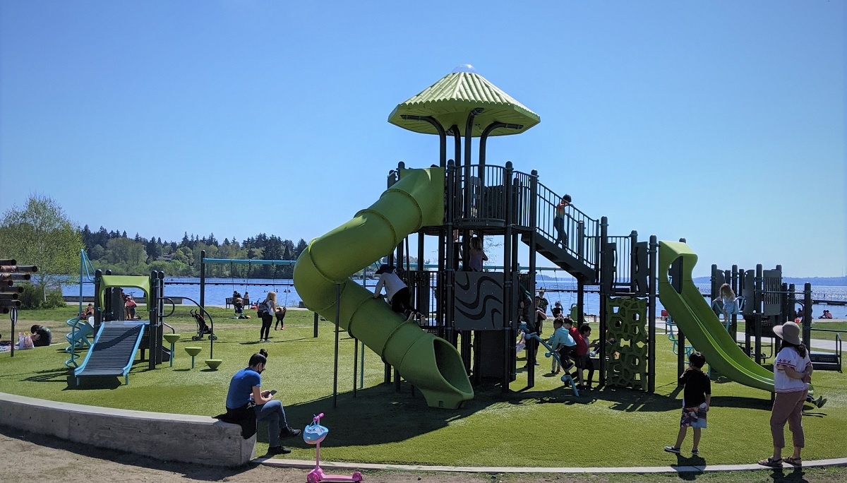 The swimming beach at Juanita Beach Park in Kirkland near Seattle is right next to a super fun updated playground