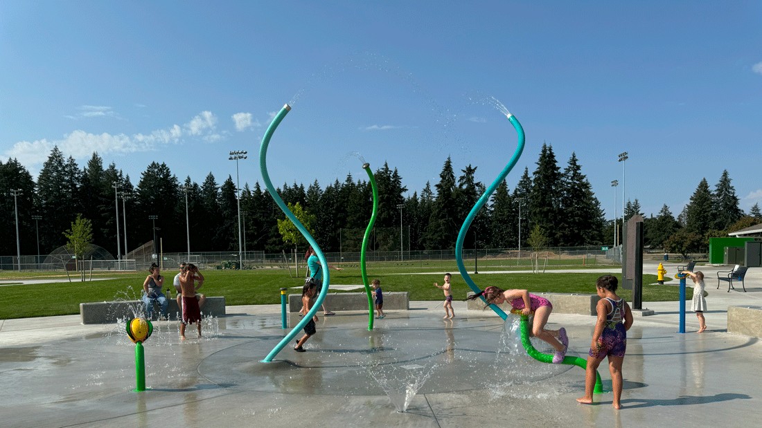 kids playing on the splash pad at Sprinker Recreation Center in Tacoma