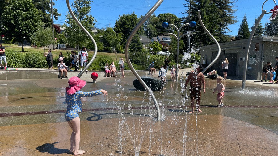 young girl playing in the water at Titlow Park in Tacoma