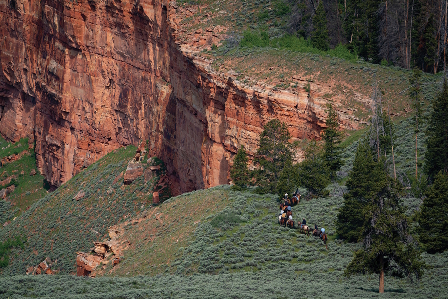 people riding horses at Darwin Ranch