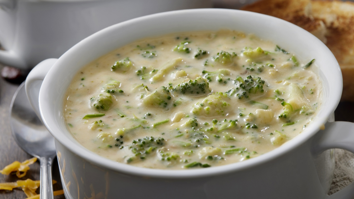 a bowl off broccoli cheese and potato soup