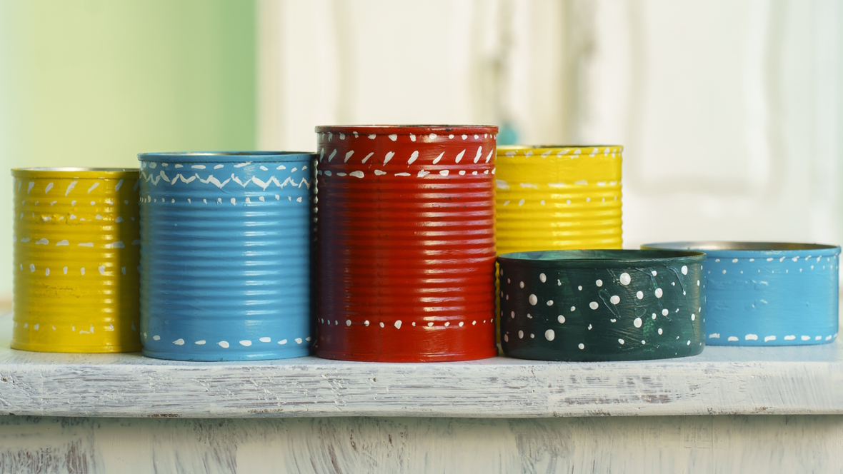 tin cans painted a variety of colors