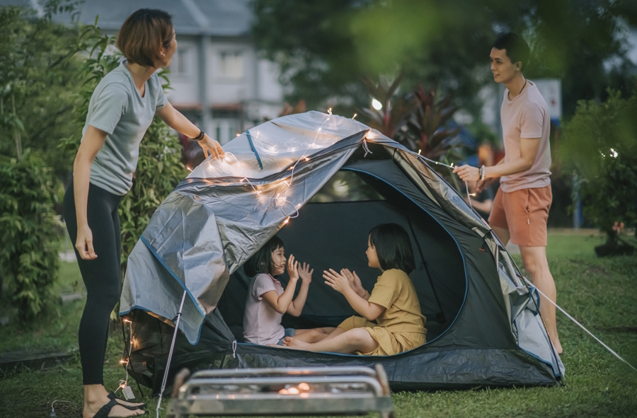 hanging up lights on a tent