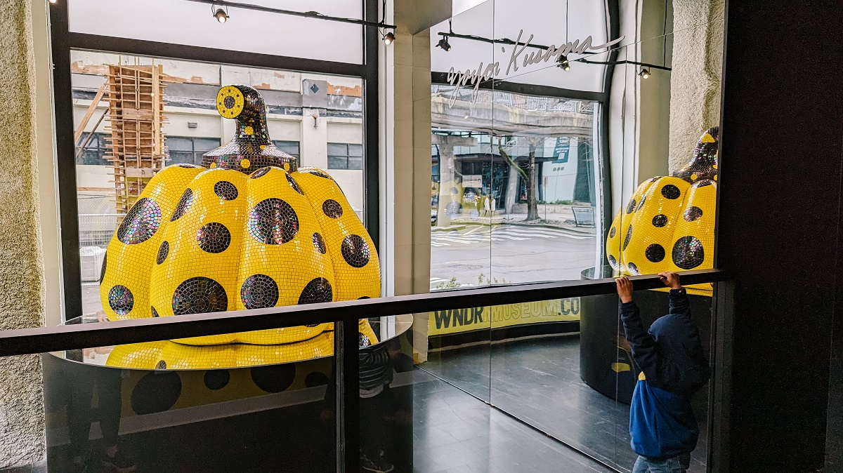 Starry Pumpkin art is visible from the front windows of WNDR Seattle museum