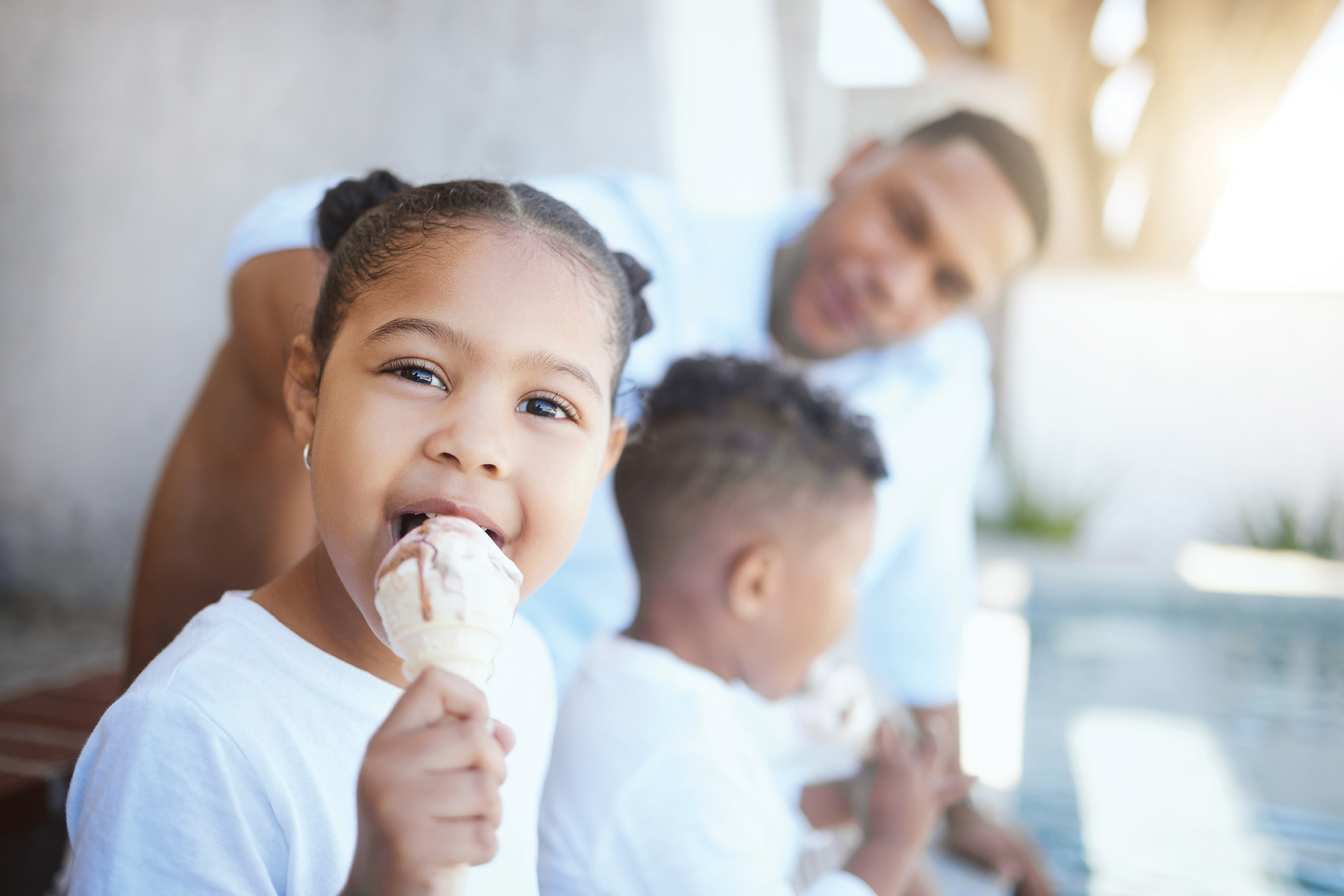 Little girl eating ice cream