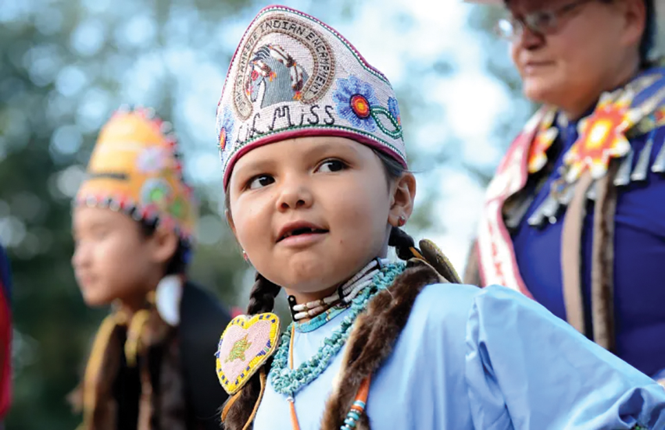 Young Native American girl in traditional clothing