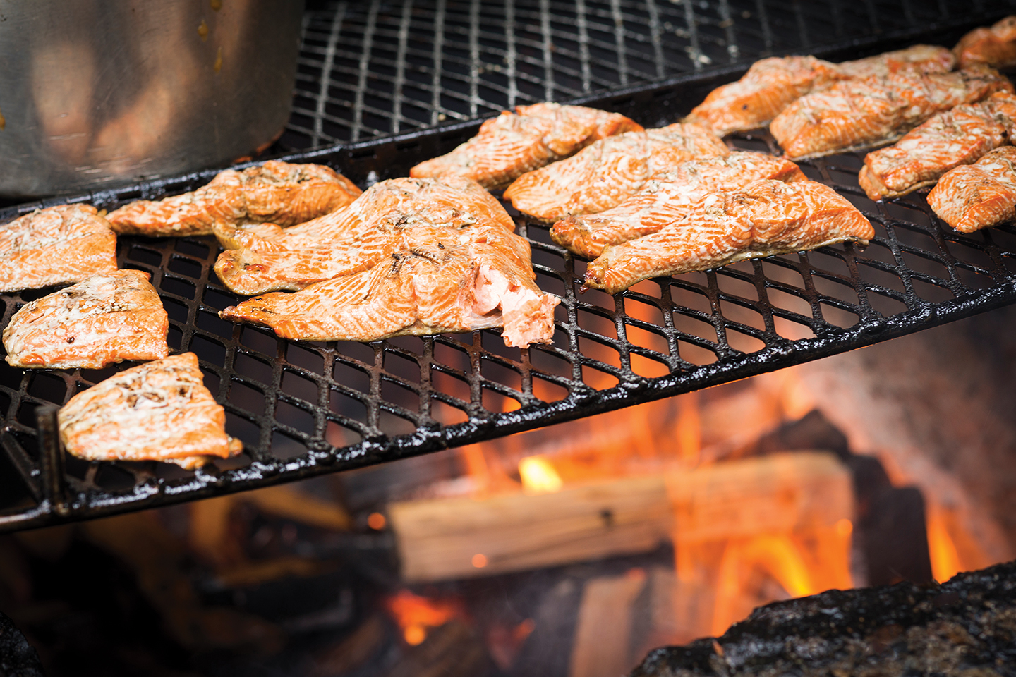 Salmon baking on a grill