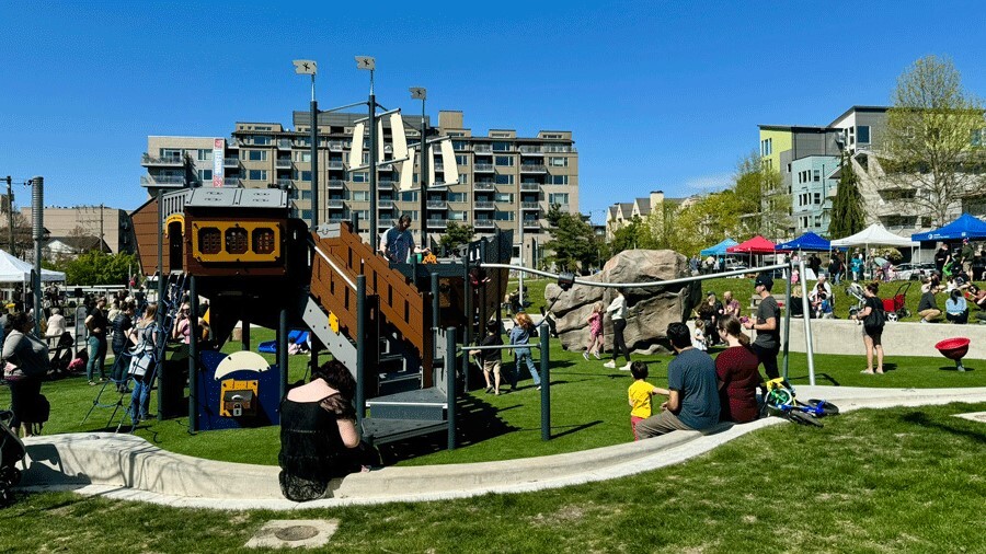 The community enjoys the newly added playground at Ballards Common Park, named The Cove, with a seat wall for parents.