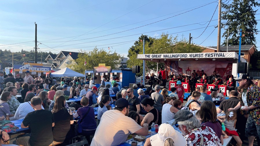 Crowds watching live music at The Great Wallingford Bratwurst Festival in Seattle